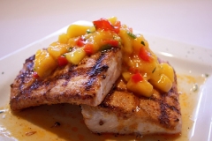 Fresh Mahi - Blackened and grilled- topped with a fresh mango salsa- any of our other fresh fish can also be prepared the same way